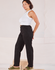 Side view of Organic Work Pants in Basic Black and Racerback Tank in vintage tee off-white on Tiara