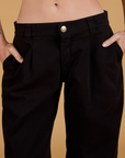 Baggy Mid-Rise Trousers in Basic Black front close up on Alex