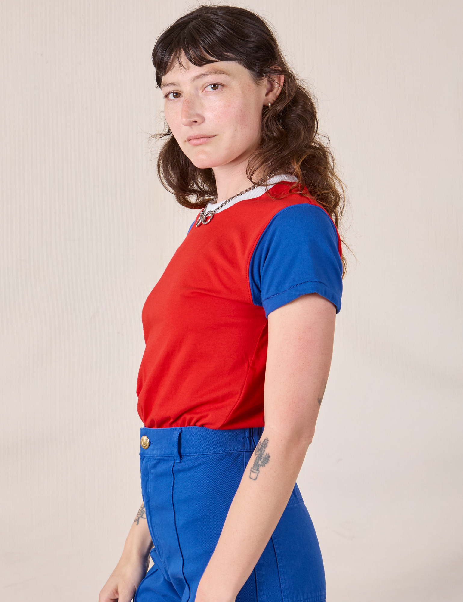 Side view of Mismatched Tee in Red & Blue on Alex