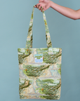 Ocean and Sky Printed Everyday Tote held by person