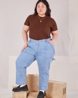 Ashley is wearing Organic Vintage Tee in Fudgesicle Brown tucked into light wash Carpenter Jeans