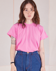 Hana is wearing Organic Vintage Tee in Bubblegum Pink tucked into dark wash Carpenter Jeans