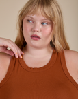 Racerback Tank in Burnt Terracotta front close up on Juliet