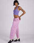 Side view of Drop Pocket Cargo Pants in Lilac Purple and faded grape Cropped Tank on Kira