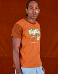 Vintage Tee in Orange Soda side view on Jerrod