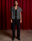 Spider Webs Pantry Button-Up and black Work Pants on Anthony