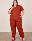 Marielena is wearing Short Sleeve Jumpsuit in Paprika
