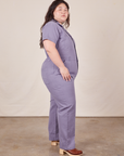 Side view of Short Sleeve Jumpsuit in Faded Grape worn by Ashley