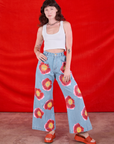 Wide Leg Denim Trousers in Painted Flowers and Cropped Tank in Vintage Tee Off-White worn by Alex