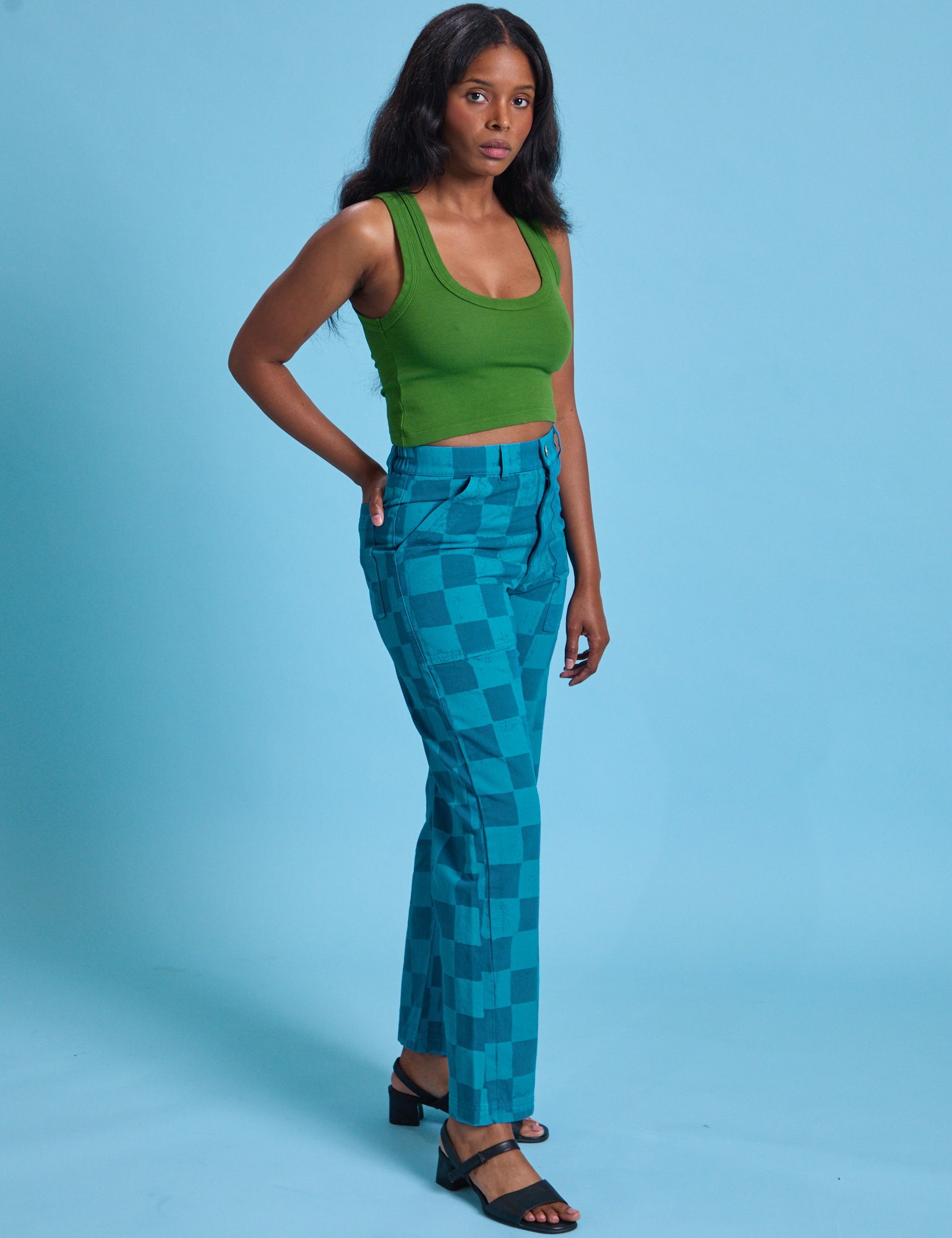 Angled front view of Checkerboard Work Pants in Blues and lawn green Cropped Tank