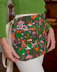 Kitchen Collection Waist Apron angled front view on Alex