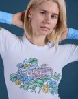 Floral Long Sleeve Baby Tee in Baby Blue front close up on Madeline