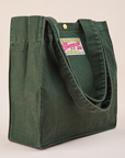 Angled view of Shopper Tote Bag in Swamp Green