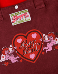 Love Big Bud Shopper Tote close up. Red heart with Big Bud text and two pink cupids on each side