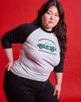 Ashley is wearing Taxi Raglan Tee in Los Angeles