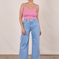 Tiara is wearing Cropped Cami in Bubblegum Pink and light wash Sailor Jeans