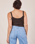 Back view of Cropped Cami in Espresso Brown and light wash Sailor Jeans worn by Tiara