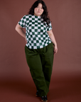 Ashley is wearing Checker Organic Tee in Swamp Green and evergreen Drop Pocket Cargo Pants