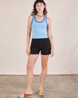Alex is wearing Colorblock Cropped Tank in Baby Blue and black Work Shorts