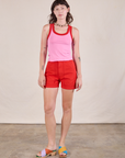Alex is wearing Colorblock Cropped Tank in Bubblegum Pink and mustang red Western Shorts