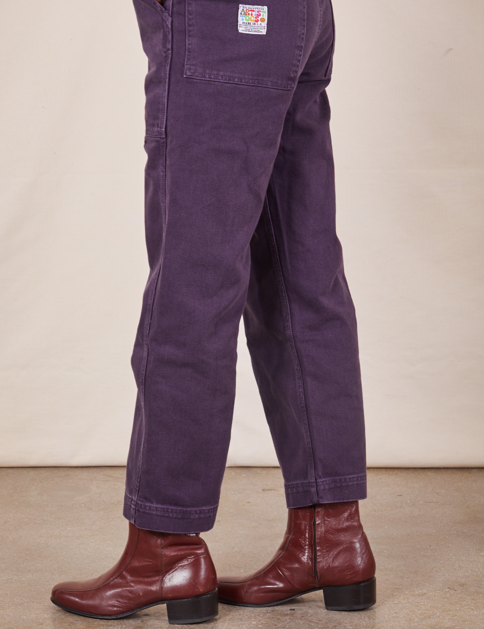 Side view pant leg close up of Original Overalls in Mono Nebula Purple worn by Jesse