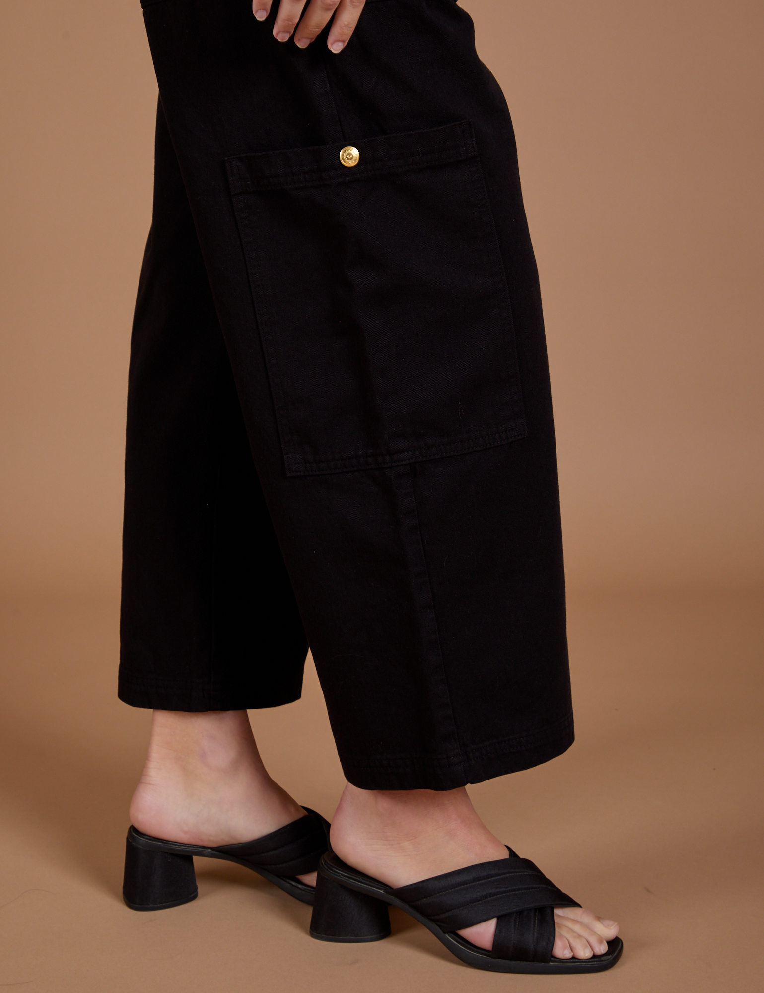 Drop Pocket Cargo Pants in Basic Black side pant leg close up on Alex