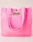 Shopper Tote Bag in Bubblegum pink with straps laying on front of bag