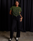 Kandia is wearing Vintage Tee in Papercut paired with black Work Pants