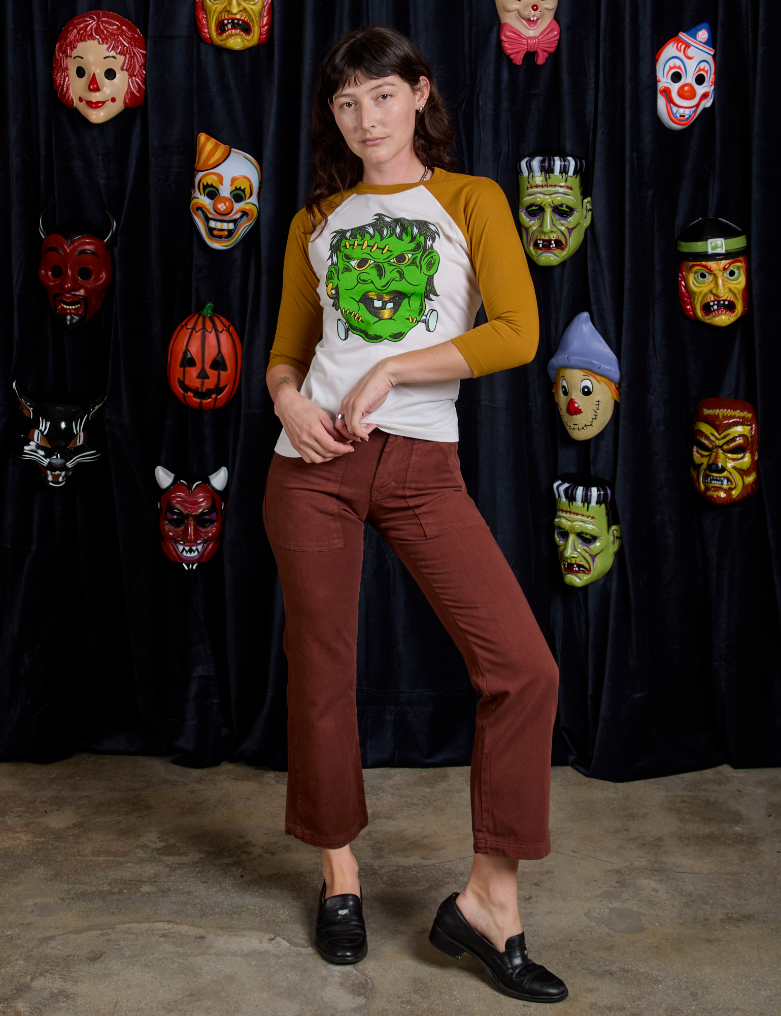 Alex is wearing Raglan Tee in Frankenstein and fudgesicle Work Pants