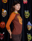 Raglan Tee in Jack-O-Lantern side view on Alex