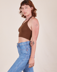 Side view of Halter Top in Fudgesicle Brown and light wash Frontier Jeans worn by Alex