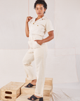 Heritage Short Sleeve Jumpsuit in Natural side view on Mika