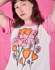 Anniversary Tee in Pink Poppy front close up on Alex