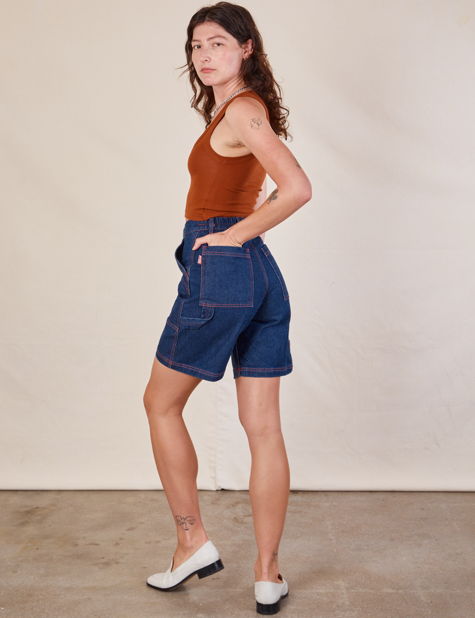Back view of Carpenter Shorts in Dark Wash on Alex