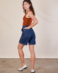 Back view of Carpenter Shorts in Dark Wash on Alex