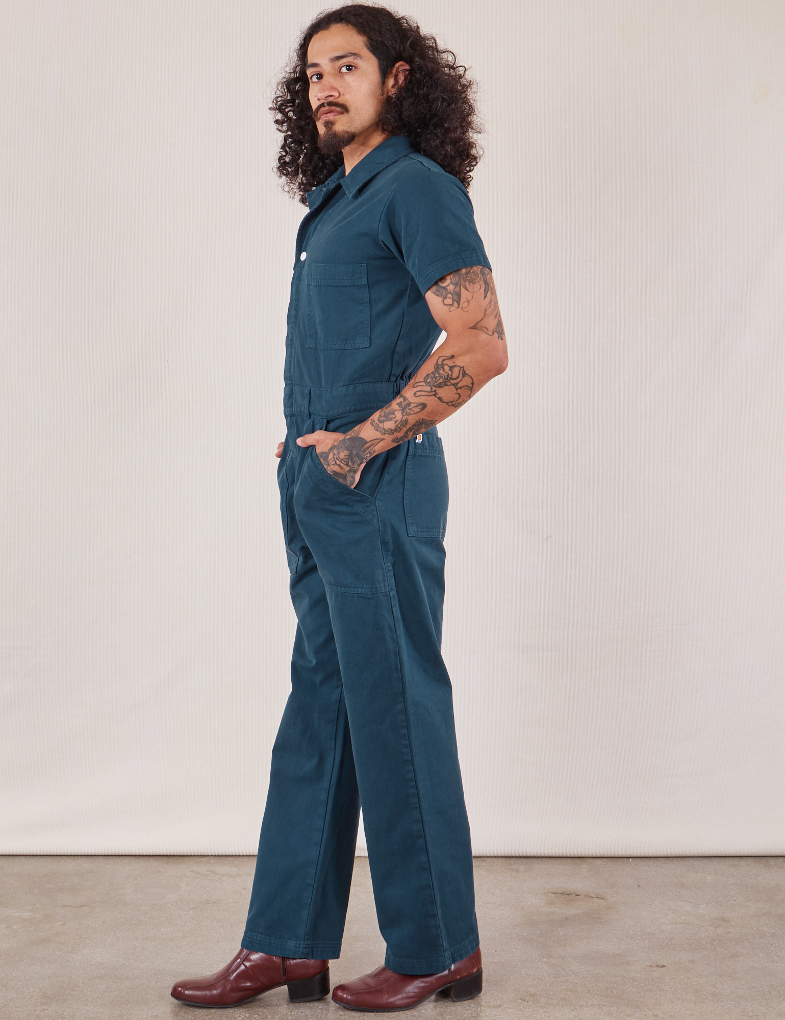 Short Sleeve Jumpsuit in Lagoon side view on Jesse