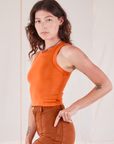 Racerback Tank in Sunset Orange side view on Alex