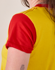 Mismatched Tee in Yellow & Red sleeve close up on Alex