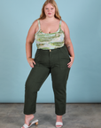 Juliet is wearing Ocean and Sky in Cami paired with swamp green Work Pants