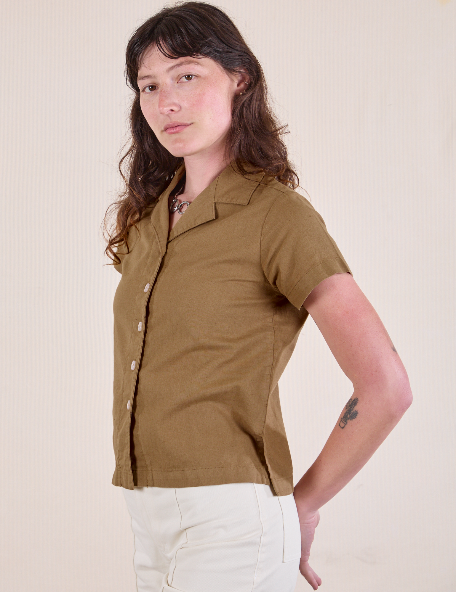 Pantry Button-Up in Desert Brown angled front view on Alex