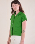 Pantry Button-Up in Kelly Green angled front view on Alex