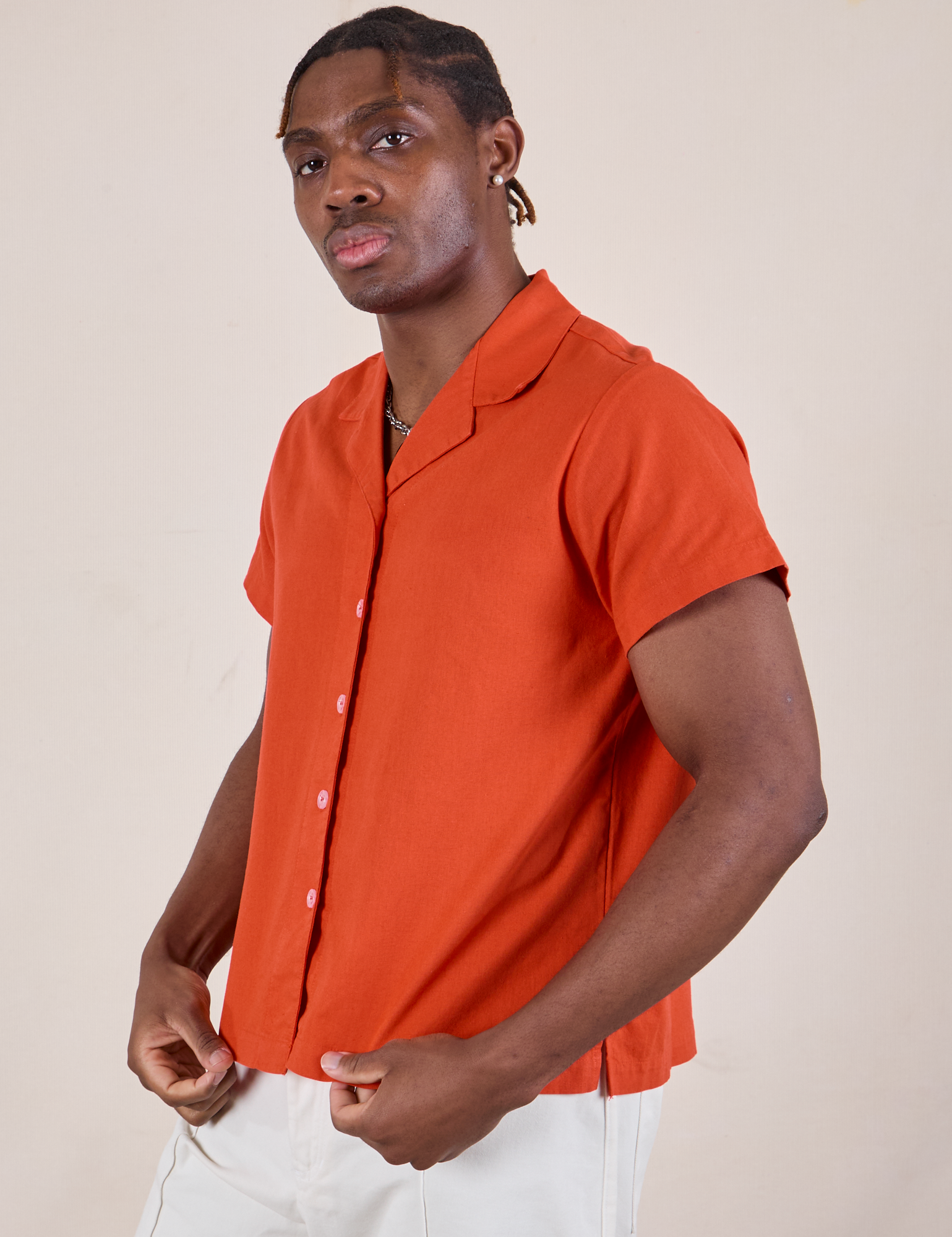 Pantry Button-Up in Chili Red angled front view on Isaac