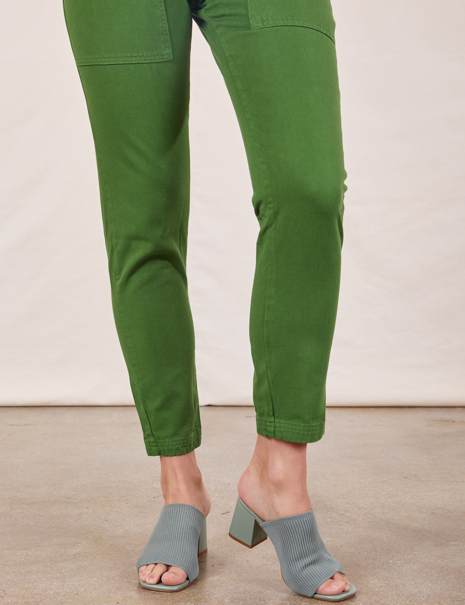 Pencil Pants in Lawn Green pant leg close up on Alex