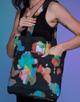 Everyday Tote in Rainbow Magic Waters worn by Alex