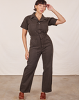 Tiara is wearing Short Sleeve Jumpsuit in Espresso Brown