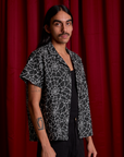 Angled front view of Spider Webs Pantry Button-Up on Anthony