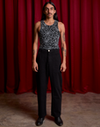 Spider Webs Racerback Tank and black Work Pants worn by Anthony