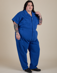 Angled front view of Short Sleeve Jumpsuit in Royal Blue on Sam
