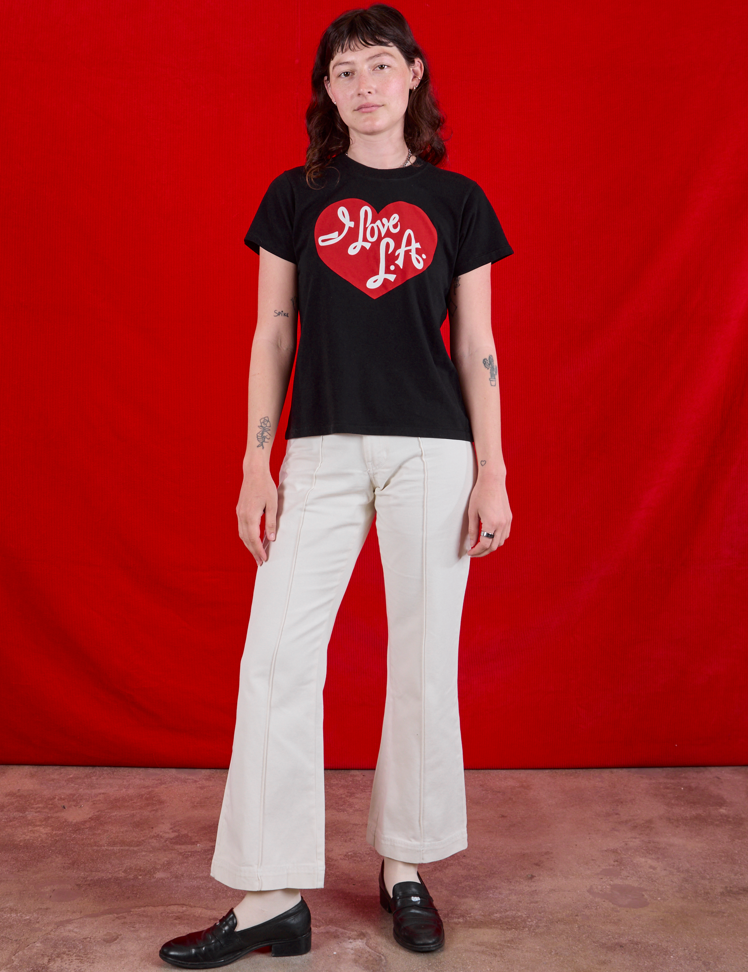 I love LA Tourist Tee and vintage tee off-white Western Pants on Alex
