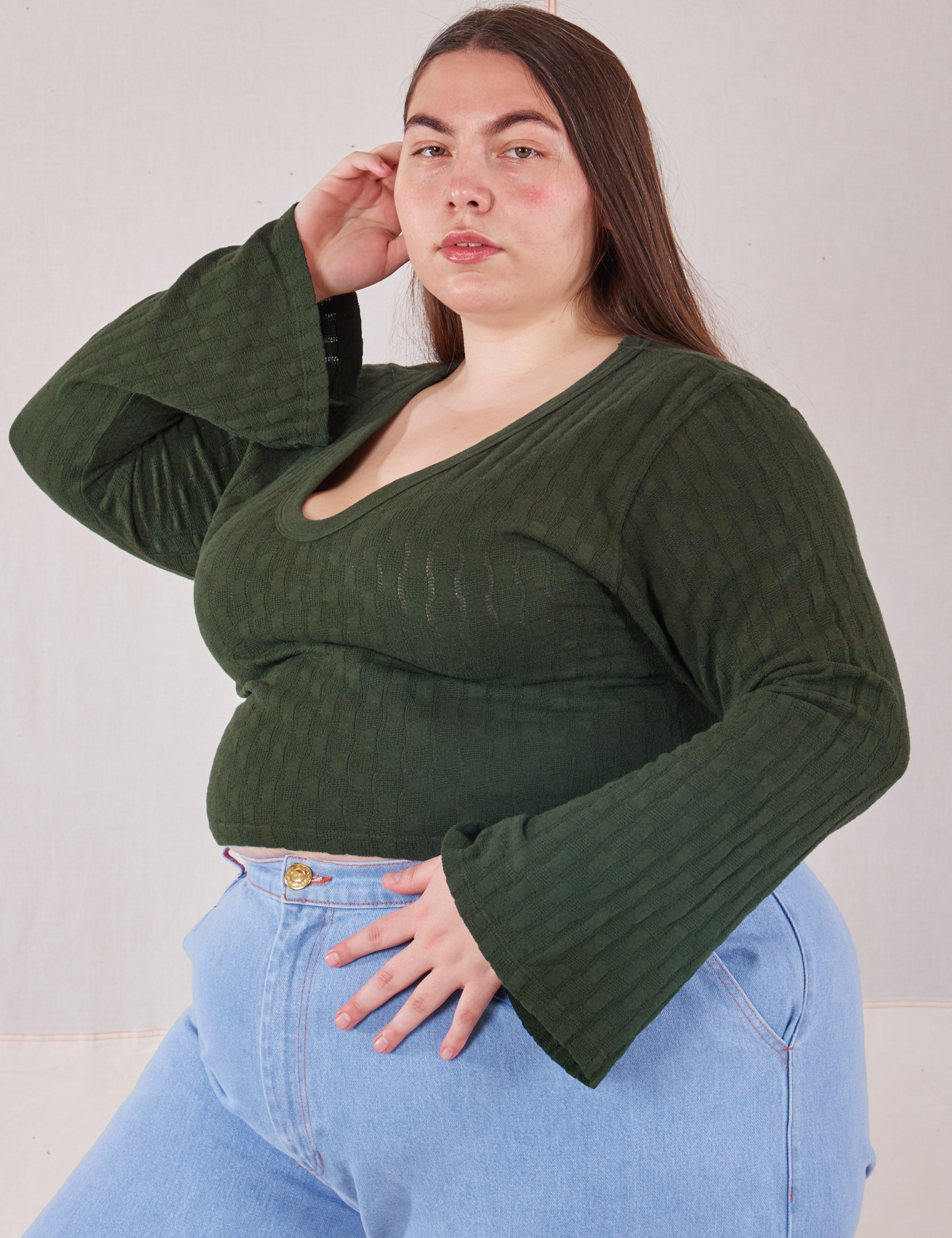 Bell Sleeve Top in Swamp Green angled front view on Marielena
